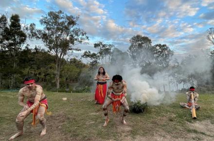 Ngarang-Wal Gold Coast Aboriginal Association traditional owners perform a traditional smoking ceremony next to a Gold Coast waterway