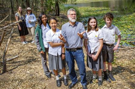 Kenmore State High School students standing at Enoggera Dam 