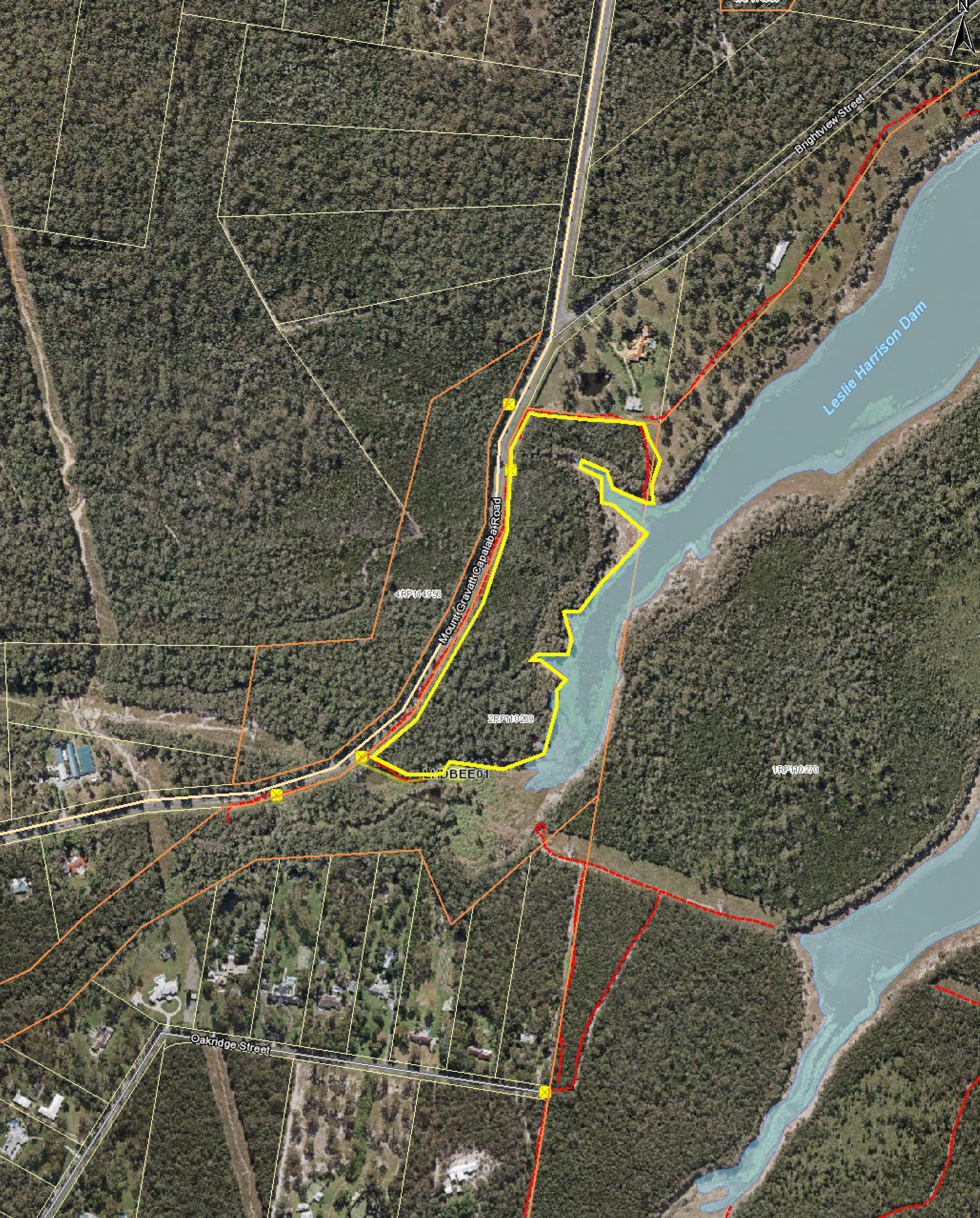 An aerial map image of Leslie Harrison Dam, with the outline of the planned burn area in yellow