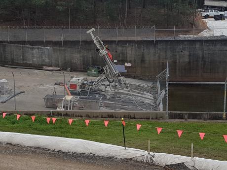 Installing dowels at the base of the spillway