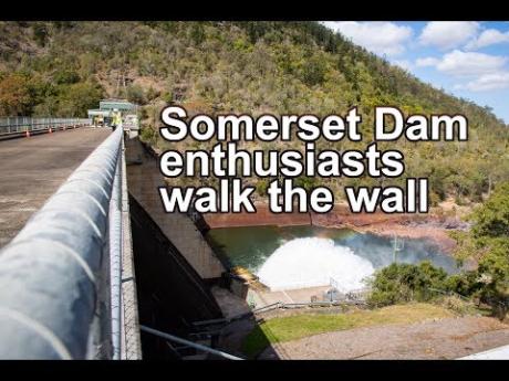 Somerset Dam enthusiasts walk the wall