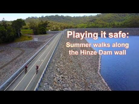 Playing it safe: Summer walks along the Hinze Dam wall