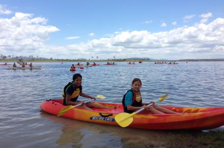Paddlers enjoy a day on the water at an Seqwater lake