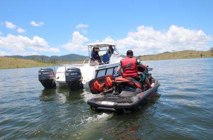 Seqwater rangers patrolling a lake