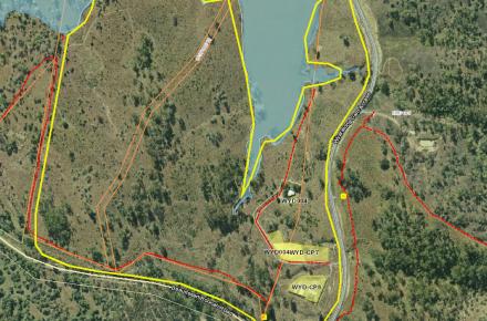 A yellow outline of the area subject to the planned burn on the shoreline of Lake Wyaralong