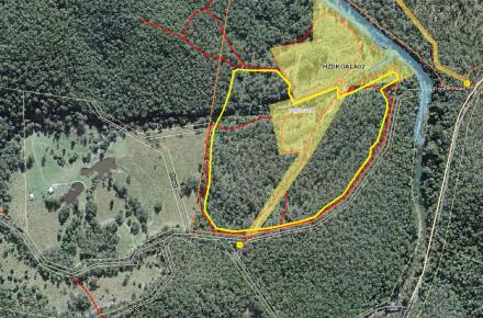 Outlined in yellow, the area next to Hinze Dam that is subject to a planned burn