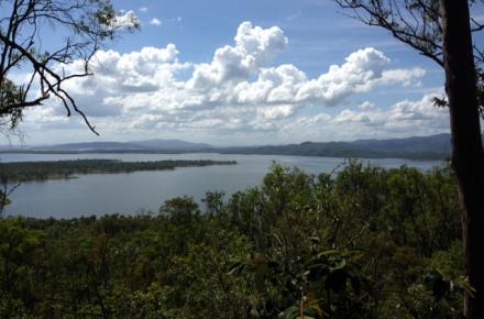 A high level view of lake Wivenhoe with clouds in the distant